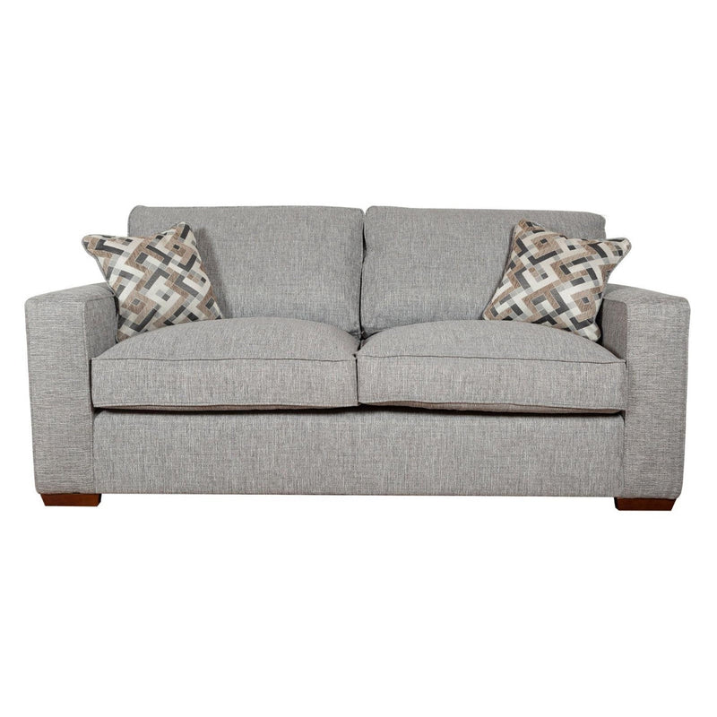 The Chicago sofa by vendor-unknown features light gray upholstery, two seat and back cushions, two geometric throw pillows, and wooden feet—ideal for a stylish modern living room.