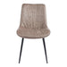 The Lilly Dining Chair features a light brown, suede-like upholstered seat with vertical stitching and slim black metal legs, shown from the front against a white background.