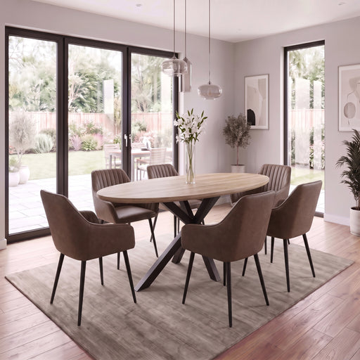 The Elson Oval Table + 6 Enzo Brown Chairs features a modern dining table with an oval wooden top and black x-shaped base, surrounded by six brown upholstered chairs with black legs.