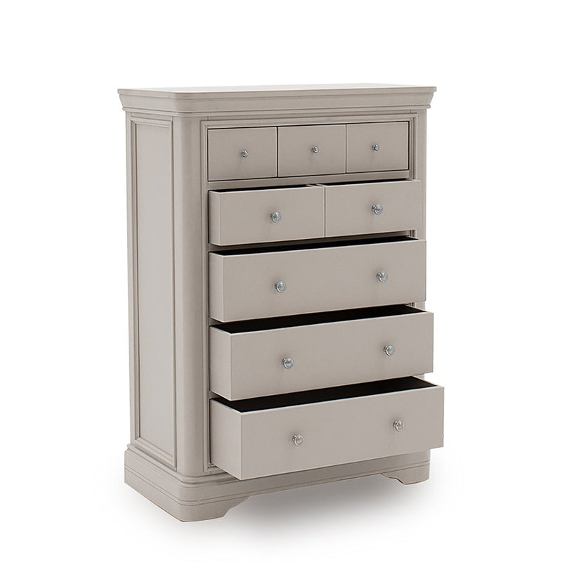 The Mabel Tall Chest by vendor-unknown features six drawers—four partially open—with round silver knobs. Part of the Mabel Bedroom Collection, it brings contemporary style to any bedroom on a plain white background.
