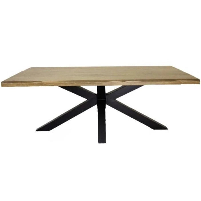 The Richmond Table by vendor-unknown is a rectangular solid oak dining table with a light natural finish and a black metal X-shaped base, shown against a plain white background for an industrial look.