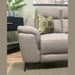 The Chloe 3+2 Electric Recliner Sofa in beige with washable fabric and a green geometric pillow sits by a black side table with a potted plant, standing on tapered legs atop a textured rug over a wooden floor.