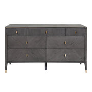 A wide 7-drawer chest of drawers with ebony and sand wood color and gold accents.