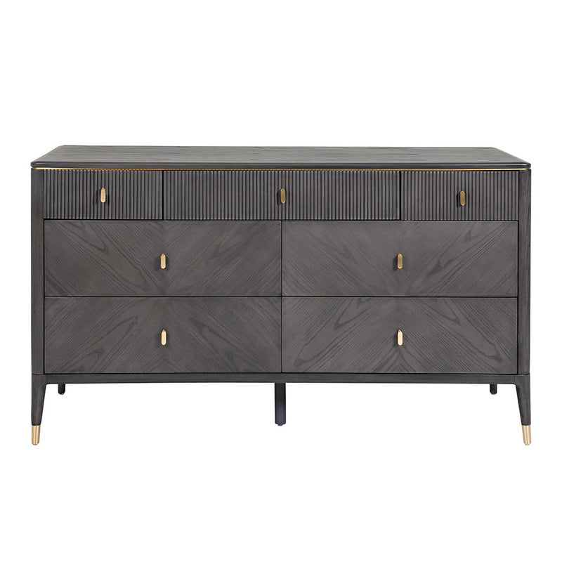 A wide 7-drawer chest of drawers with ebony and sand wood color and gold accents.