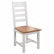 The Skellig Dining Table & 4 Chairs by vendor-unknown features a wooden chair with a white frame, ladder-style backrest, and oak top seat, shown against a plain white background.
