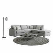 The Chicago Corner Group, shown on a white background, features a light gray corner sofa with four cushions, a black floor lamp with a round white shade, a low rectangular coffee table, and a round woven rug for modern living rooms.