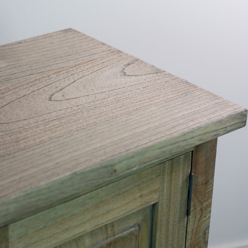 A close-up of the Marwood Large Sideboard Console's top corner shows its light wood grain and slightly weathered finish against a plain background. Dimensions: 82 cm high, 150 cm wide.