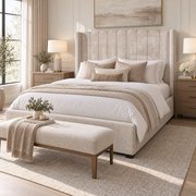 Kildare Storage Bedframe featuring a high, vertical-channel tufted headboard and a matching bench at the foot of the bed.