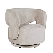 A contemporary design accent chair with a smooth swivel function, upholstered in luxurious mink color.