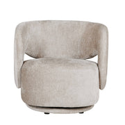 The Koa Accent Chair has a contemporary design with a light beige swivel base, rounded back, curved armrests, and soft textured mink upholstery.