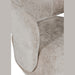 Close-up of the Koa Accent Chair showcases its contemporary style and plush, light beige mink upholstery, focusing on the seat, armrest, and part of the backrest with a soft, textured finish.