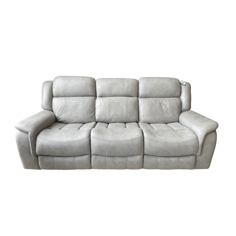 The Reno Recliner Sofa is a modern three-seater in light gray with plush cushions and padded armrests, upholstered in soft, washable fabric, shown against a white background.