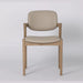 The Mila Beige PU Dining Chair is a modern solid wood chair with a light beige cushioned seat and backrest, shown against a plain white background.