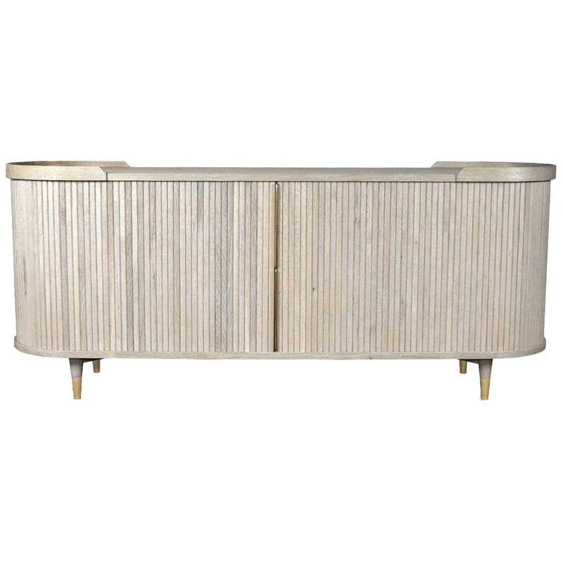 The Preston Large Sideboard features a light wood finish, curved edges, vertical slatted front detailing, and short tapered legs.
