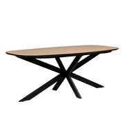 The Sadie Oval Dining Table features a light wood top and black metal legs crossed in an X-shape, shown on a plain white background.