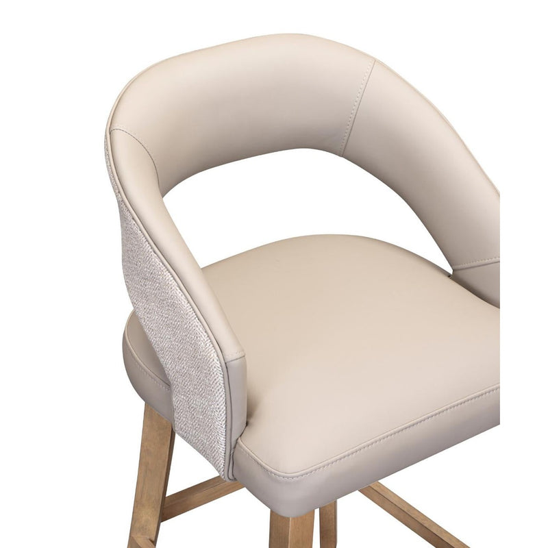The Willow Dining Chair features a modern design with a light beige padded seat, curved backrest, textured outer fabric, and wooden legs.