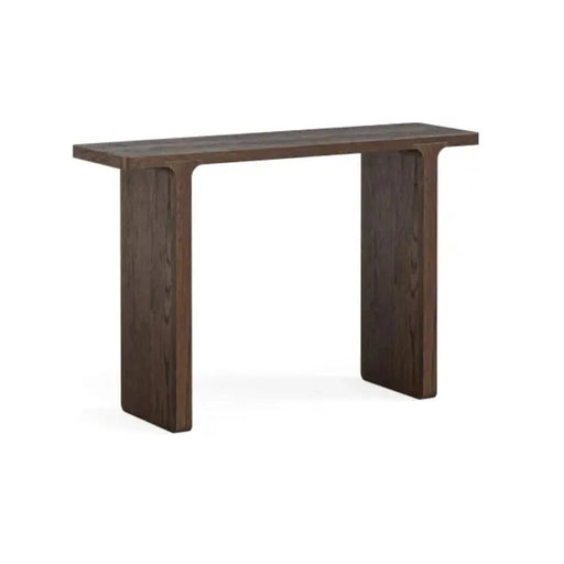 The California Console is a modern dark oak table with an espresso-brown finish, a rectangular top, and two wide flat legs. Its contemporary design features clean lines and minimalist elegance, free of extra detailing or shelving.