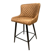 The Diamond Counter Stool features modern brown PU leather with quilted diamond stitching, a light brown cushioned seat and backrest, and four slender black metal legs with a footrest—ideal for any kitchen island.