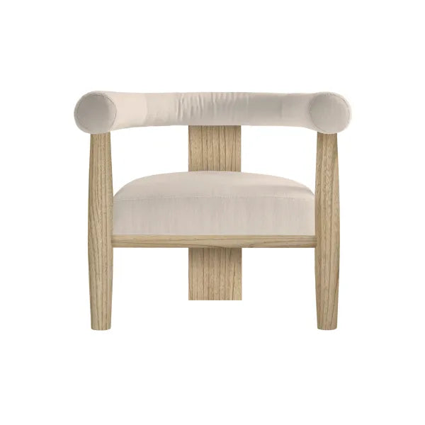 The Dakota Armchair features natural oak legs and frame, a curved upholstered backrest, and a cream cushioned seat, shown on a white background—making it ideal for any contemporary living room.