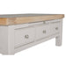 A close-up of the Doune Coffee Table, featuring a light gray finish, natural oak veneer top, three storage drawers with silver knobs.