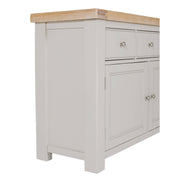 The Doune Sideboard is shown from an angled side view against a white background, featuring a light gray finish, oak veneer-style wooden countertop, two drawers with round metal knobs, and cabinet doors below.