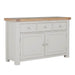 The Doune Sideboard, a large taupe piece with two cabinets, three drawers, a natural wood top, and round metal knobs, stands against a white background.