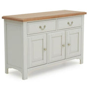 Traditional white or gray painted buffet cabinet featuring a contrasting light oak wood surface and three storage cupboards below two drawers.