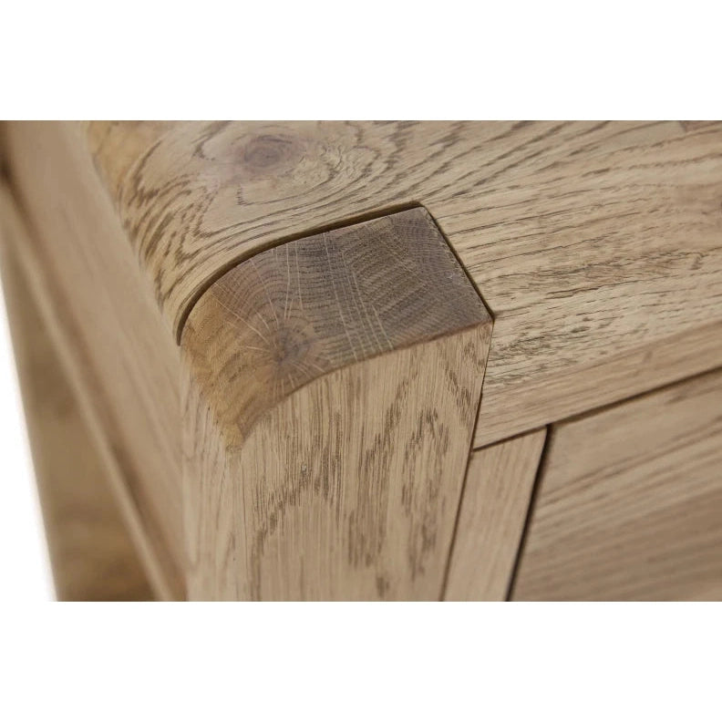 Close-up of the Edson Nest Of Tables corner, showcasing detailed oak wood grain and precise joinery with a smooth, natural finish.