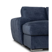 The Grand Corner Group 4L is a modern modular sofa in dark blue upholstery with wide armrests, metal legs, and supportive micro pocket springs, displayed against a white background.
