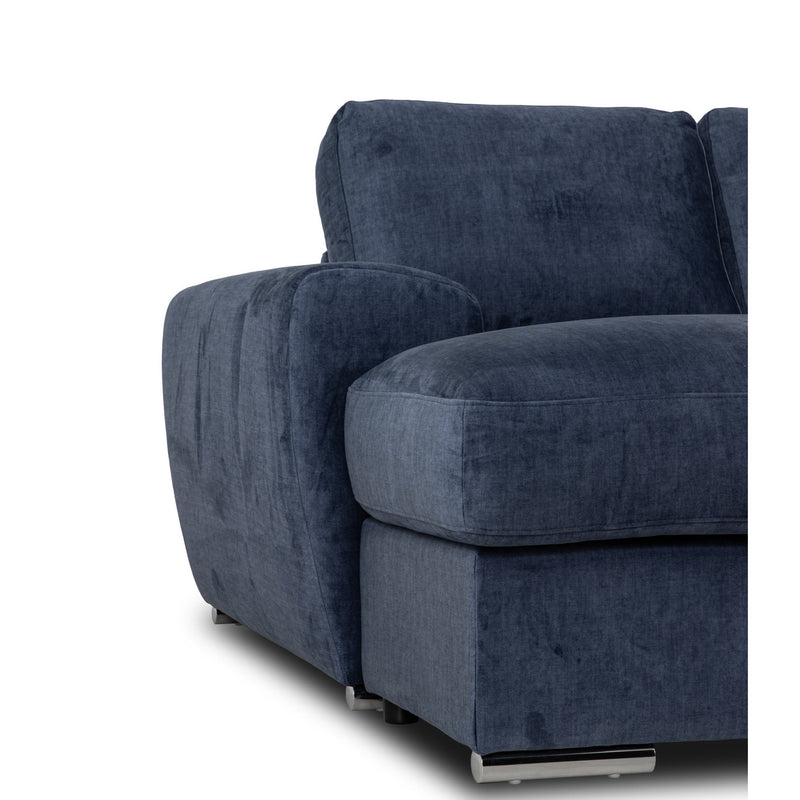 The Grand Corner Group 4L is a modern modular sofa in dark blue upholstery with wide armrests, metal legs, and supportive micro pocket springs, displayed against a white background.