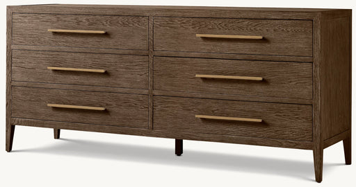 The Hampshire Wide Chest features a dark wood finish, six drawers in two rows with long gold handles, and stands on four tapered legs.