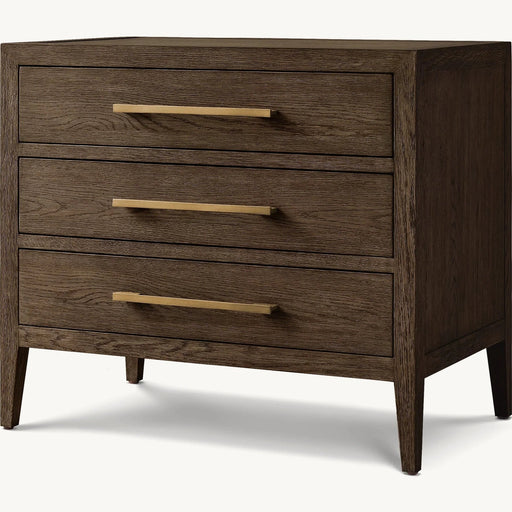 The Hampshire Locker is a modern dark wood dresser with three drawers featuring gold accents, long horizontal handles, and simple tapered legs, giving it a timeless and sophisticated style.