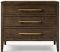 The Hampshire Locker, a dark wood dresser with three drawers, gold horizontal handles, and tapered legs, adds timeless style to any space, displayed here against a plain white background.