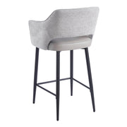 Massie Counter Stool with a gray fabric back, a solid seat, and four thin black legs with a footrest.
