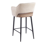 Massie Counter Stool with a beige upholstered backrest, a tan seat, and black metal legs.