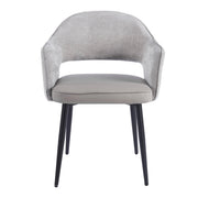 Massie Dining Chair with a curved, textured gray upholstered back, a smooth gray seat, and four tapered black legs.