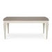 The Montreux Range 180cm-225cm Set is a rectangular, extendable dining table with a light brown top and white turned legs. Shown against a white background, it pairs well with wooden or leather chairs for an inviting dining space.