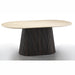 The Athens Coffee Table features an oval light wood top and a wide, dark textured pedestal base that tapers toward the top, showcased against a plain white background.