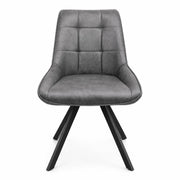 The Pedro Dining Chair is a modern gray upholstered dining chair with a cushioned seat and backrest, featuring quilted square stitching and four angled black metal legs. Photographed from the front against a white background, this elegant chair combines comfort and contemporary style for any space.