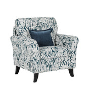 The Pippa Accent Chair features dark wooden legs and white fabric with dark blue abstract leaf designs. It comes with a matching dark blue square cushion for added comfort.