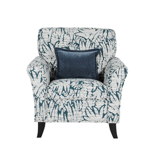 The Pippa Accent Chair features white and dark blue upholstery with a leaf pattern and includes a square dark blue throw pillow centered on the backrest.