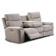 The Sheldon Electric Recliner is a gray two-seater sofa featuring plush cushions, soft fabric upholstery, a central armrest console, built-in USB port, modern design, and an extended footrest on one seat.