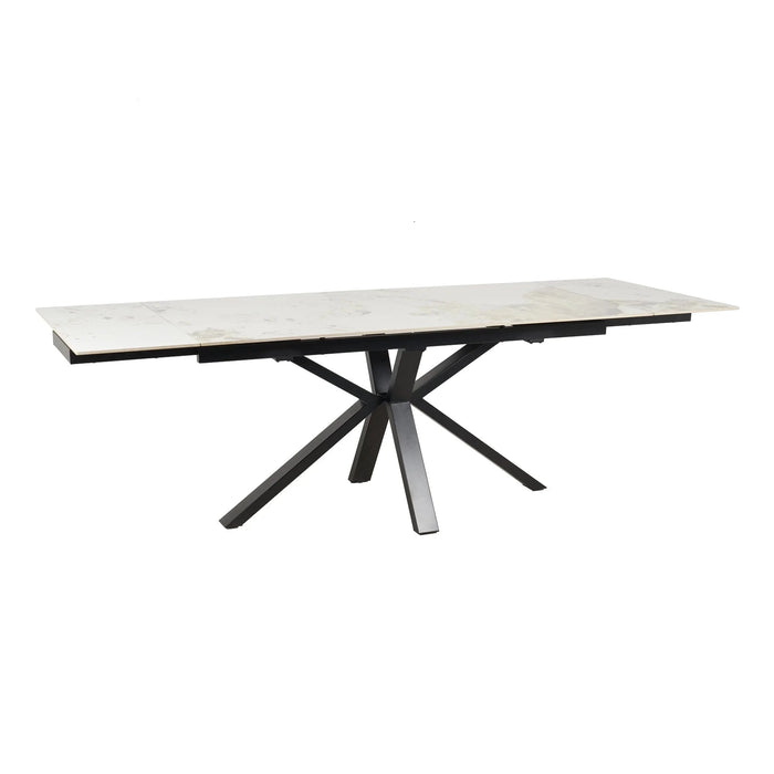 The Sorrento Dining Table features a white marble top and black angular metal legs in a striking starburst pattern.