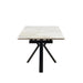 The Sorrento Dining Table features a rectangular white marble top and black metal legs, shown from the short end against a plain white background.
